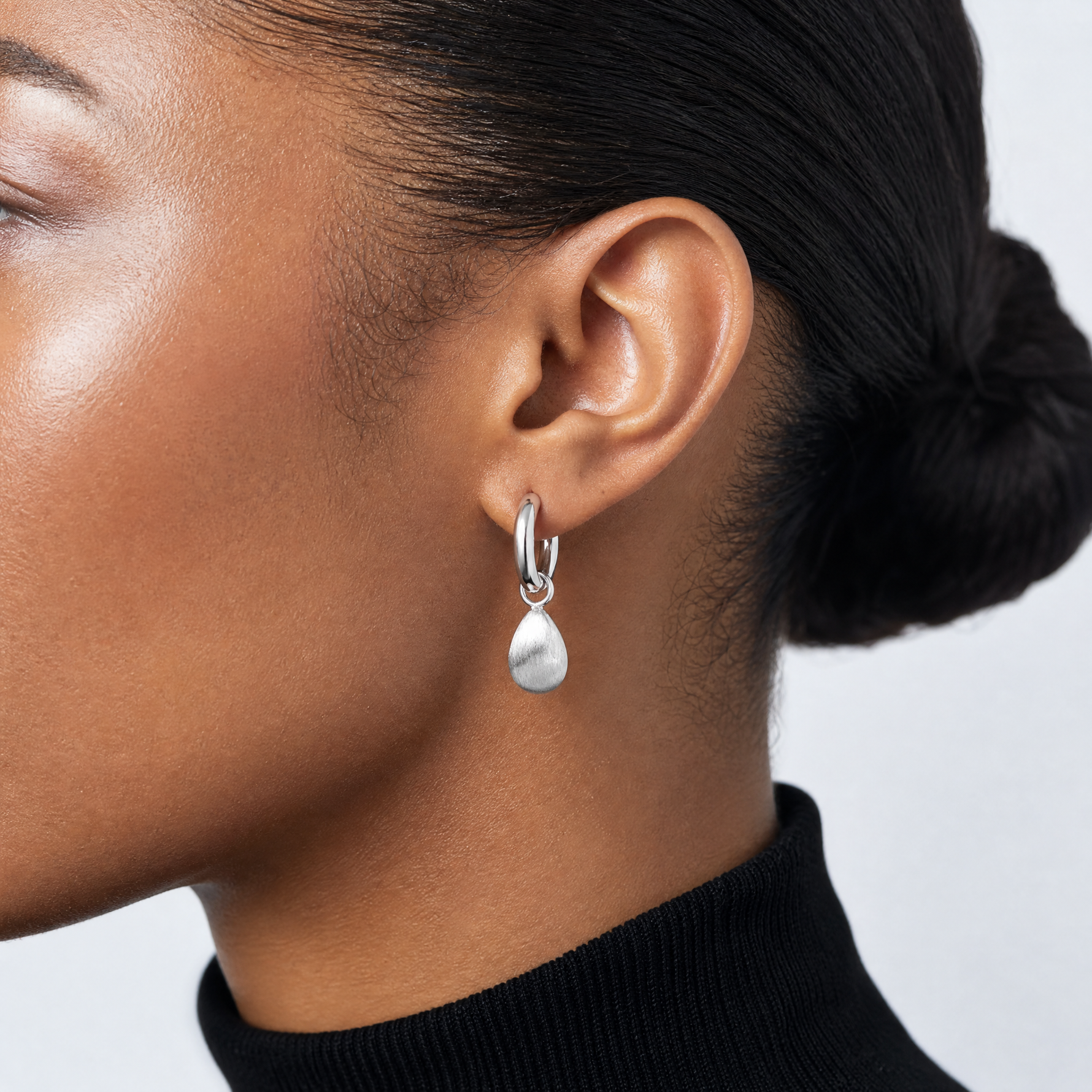 Leslie's SS RH-plat Polish/Brushed Teardrop Huggie Hoop Earrings - Model Shot