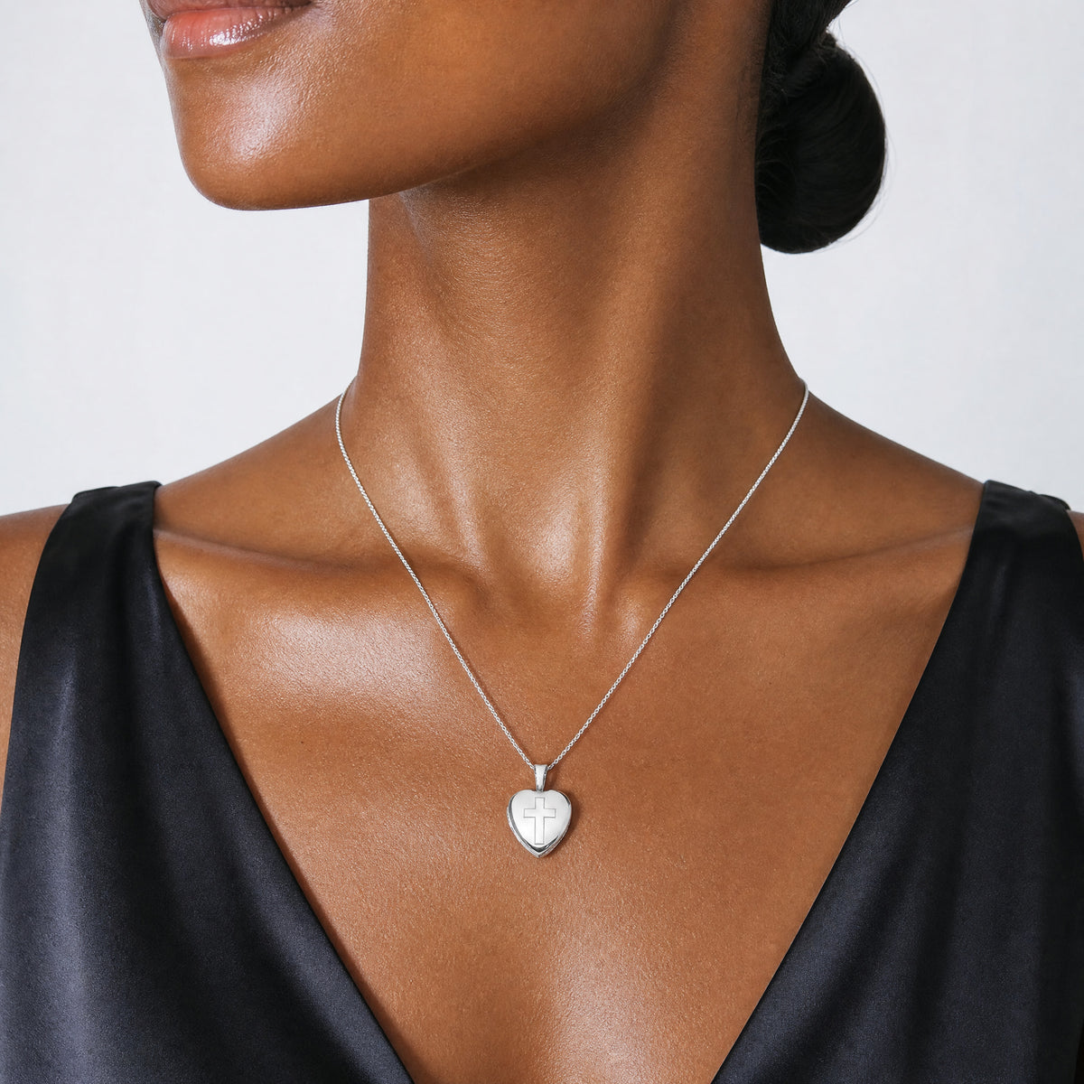 Sterling Silver Rhodium-plated Polished Cross 12mm Heart Locket - Model Shot