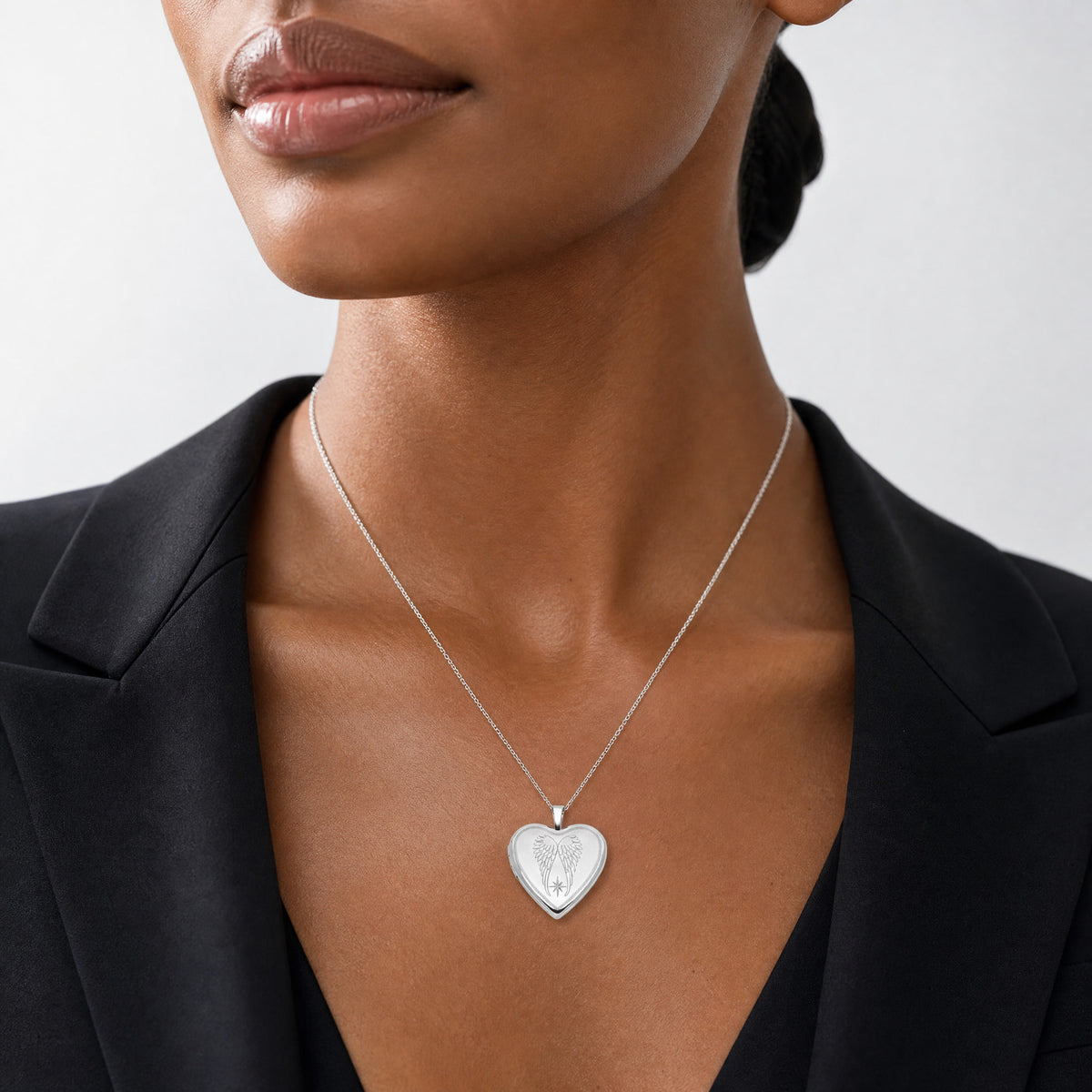 Sterling Silver RH-plated Satin/Polished Angel Wings 20mm Heart Locket - Model Shot