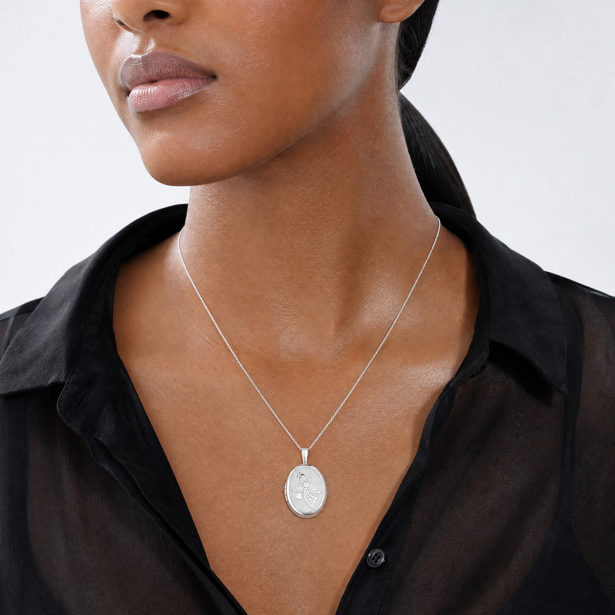 Sterling Silver Rhodium-plated Diamond 19mm Angel Oval Locket - Model Shot