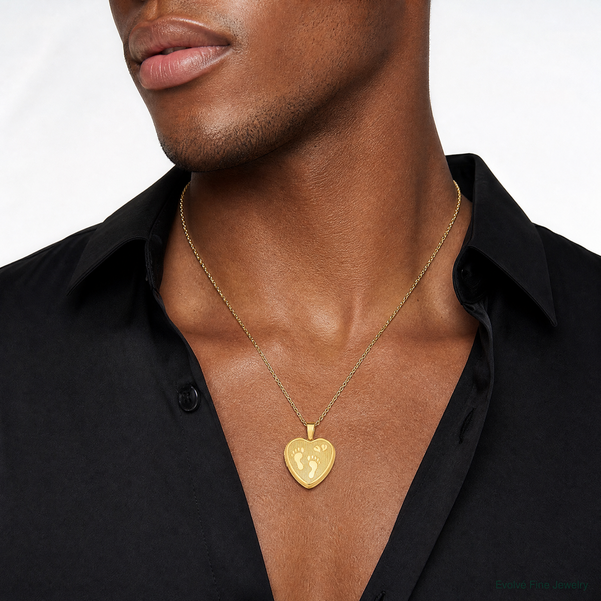SS Gold-plated Brushed And Polished Footprints 12mm Heart Locket - Model Shot