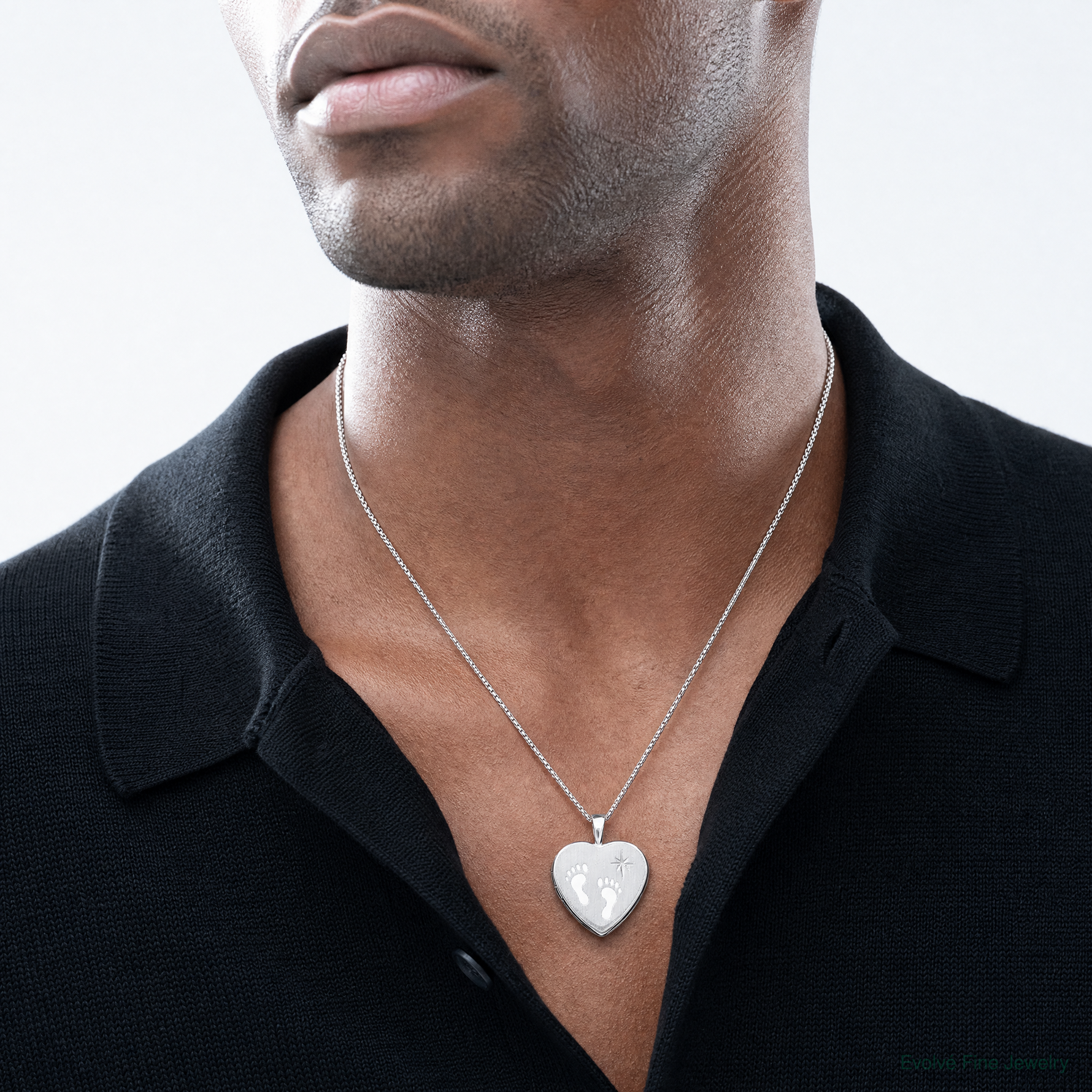 SS RH-pl Brushed And Polished Footprints And Star 16mm Heart Locket - Model Shot