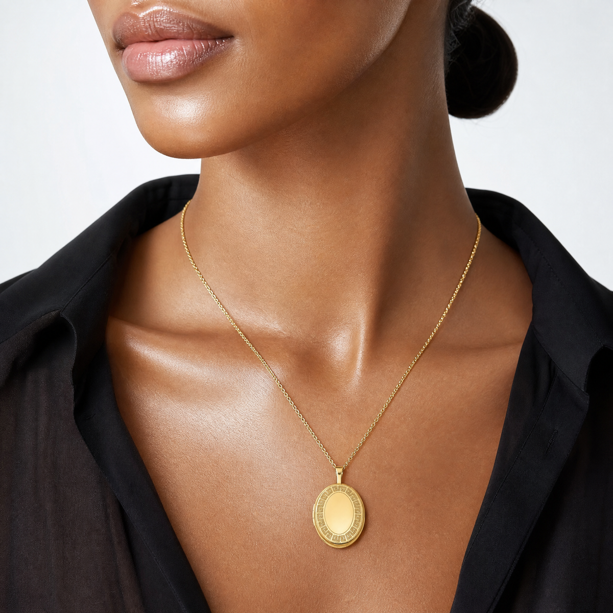 SS Gold-plated Brushed And Polished Greek Key 19mm Oval Locket - Model Shot