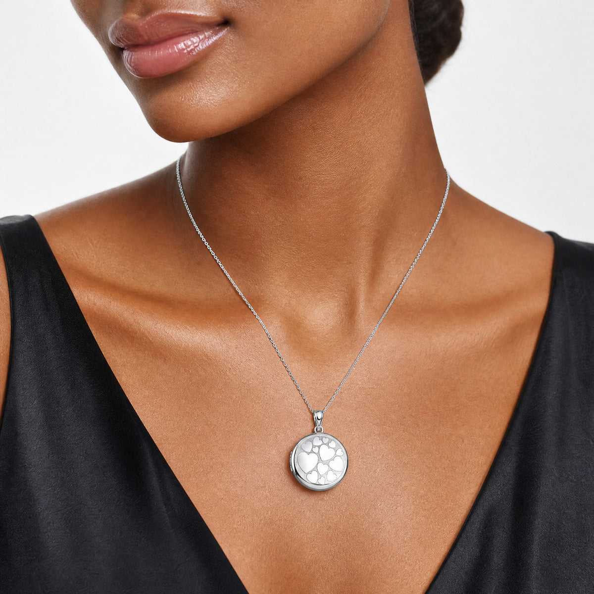 Sterling Silver RH-pl Brushed And Polished Multi Heart 20mm Round Locket - Model Shot