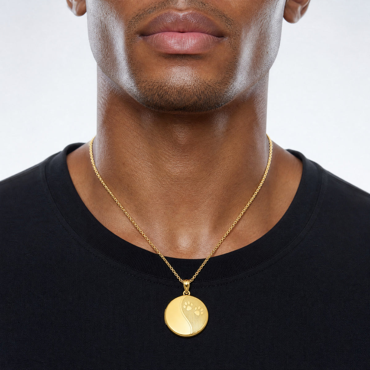 SS Gold-plated Brushed And Polished Paw Print 20mm Round Locket - Model Shot