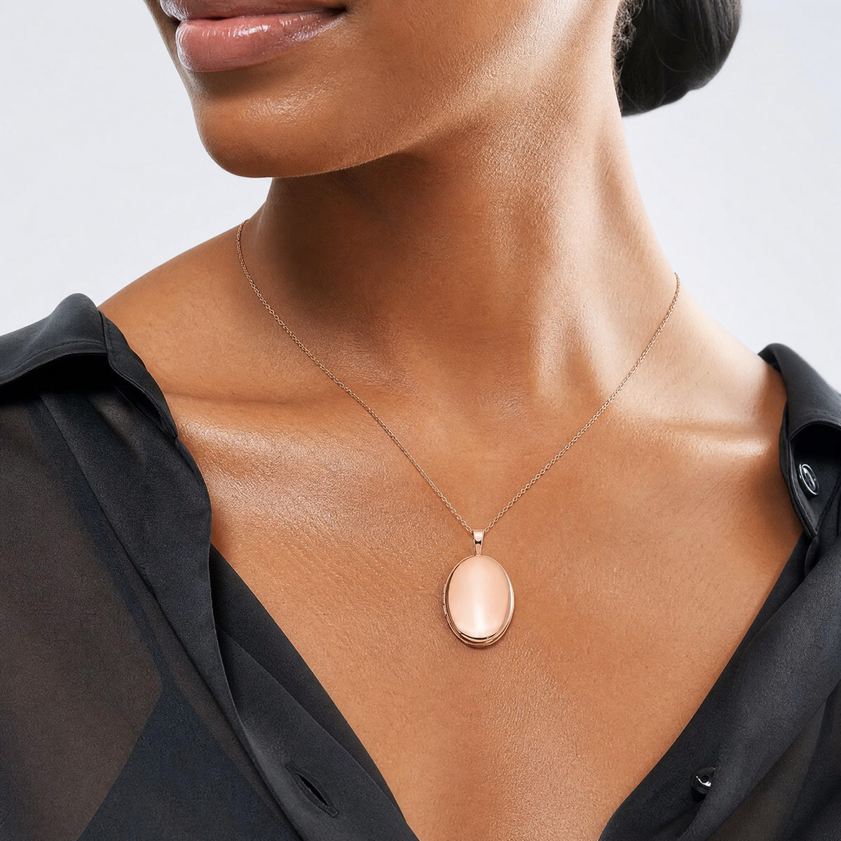 Sterling Silver Rose Gold-plated 20mm Polished Oval Locket - Model Shot