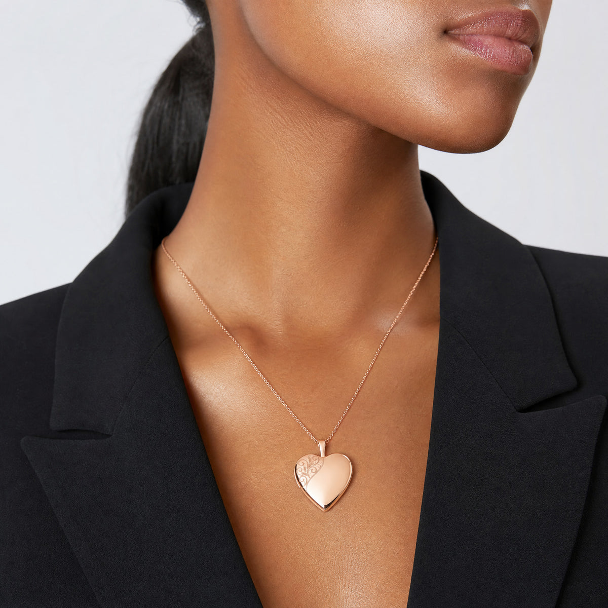 Sterling Silver Rose Gold-plated 20mm Polished Swirl Heart Locket - Model Shot