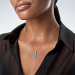 Sterling Silver Rhodium-plated Polished Blue Topaz Oval Pendant - Model Shot
