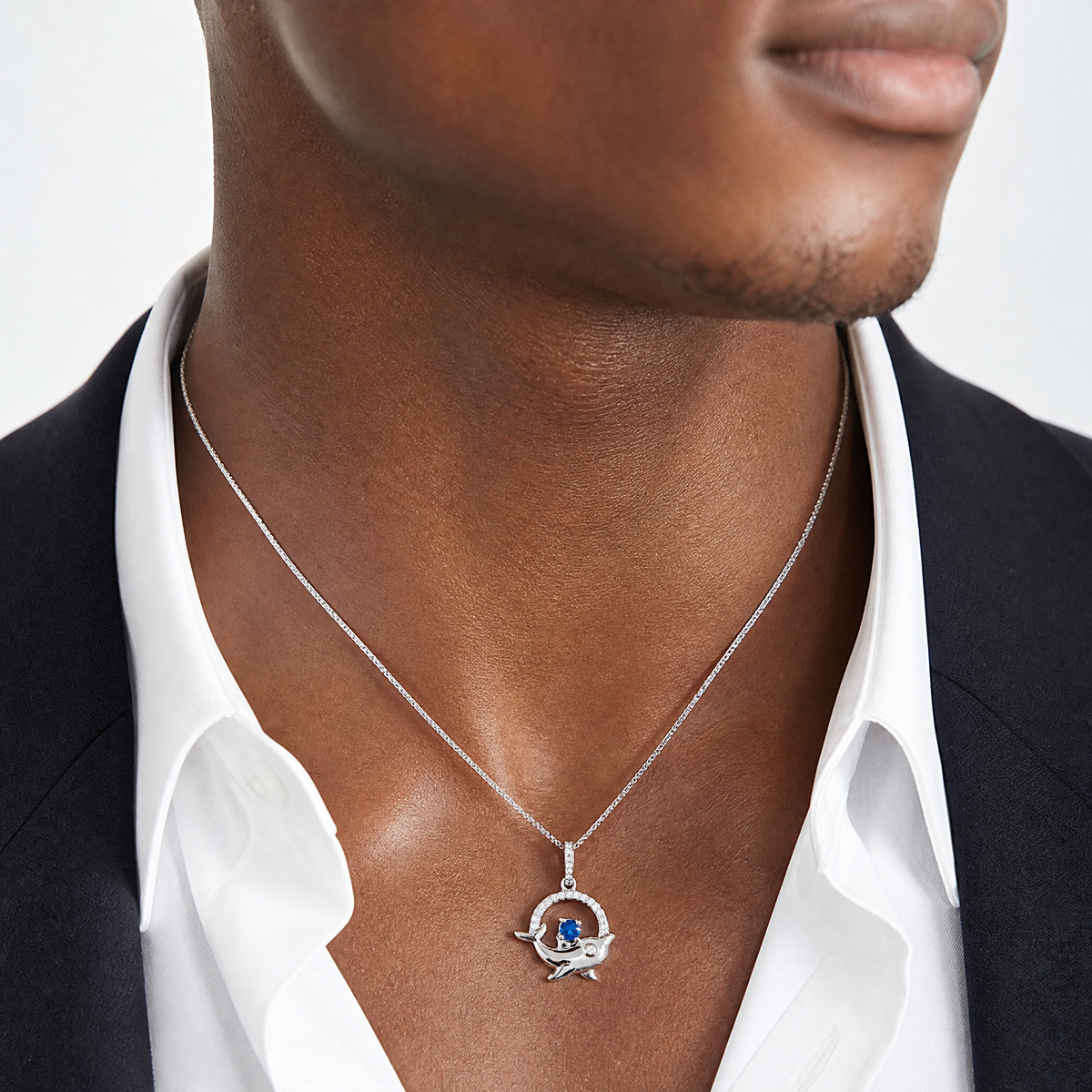 Sterling Silver Rhodium-plated Blue and White CZ Dolphin Pendant - Model Shot
