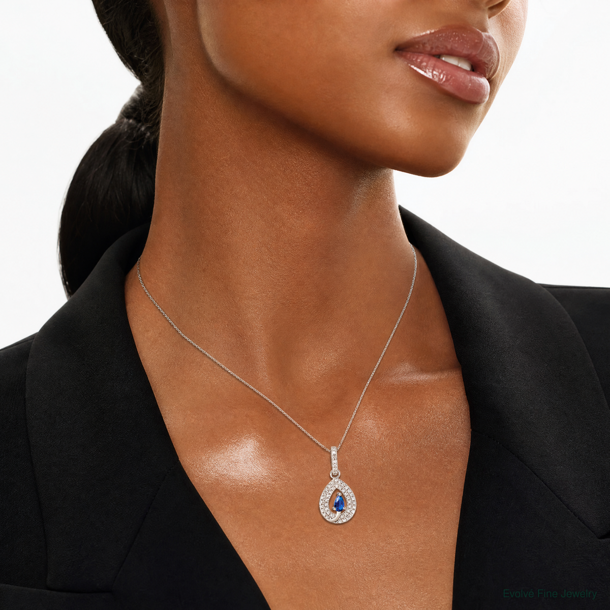 Sterling Silver Rhodium-plated Blue and White CZ Teardrop Pendant - Model Shot