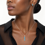 Sterling Silver Polished Blue Topaz Pendant and Post Earrings Set - Model Shot