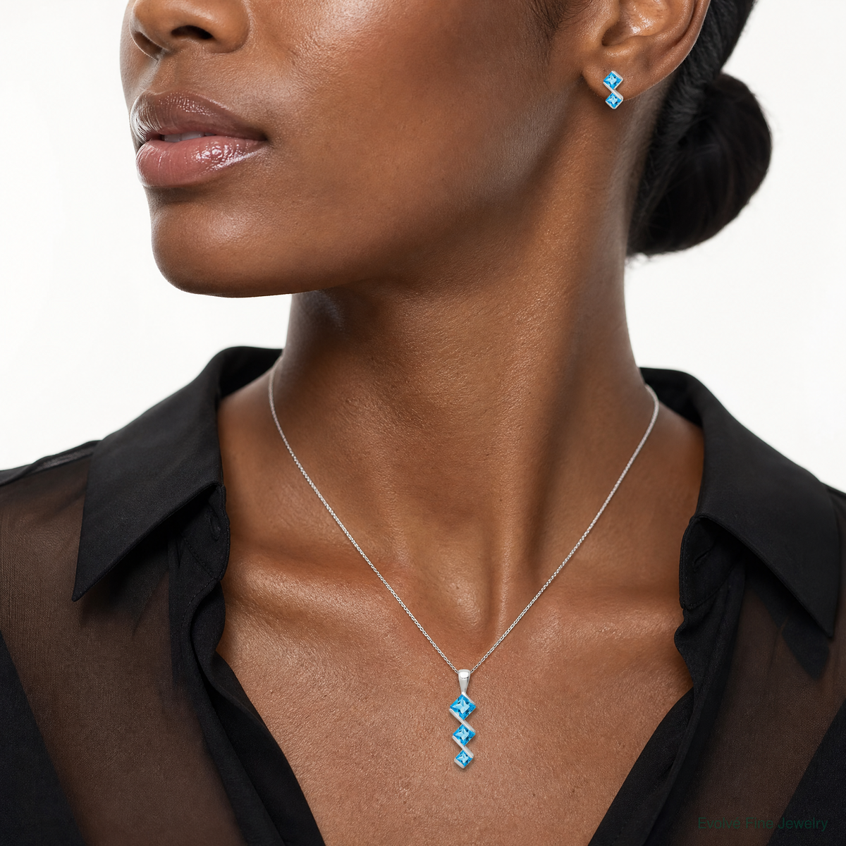 Sterling Silver Polished Blue Topaz Pendant and Post Earrings Set - Model Shot