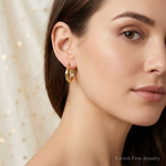 14k Polished Twisted Hollow Hoop Earrings - Model Shot
