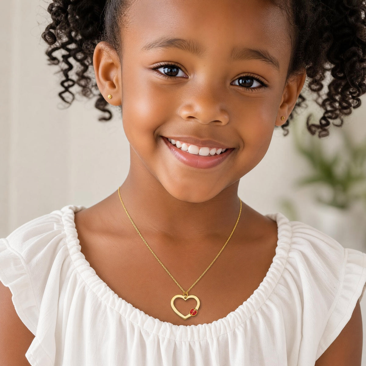 14k Polished Heart With Enamel Ladybug w/.75in Ext Children's Necklace - Model Shot