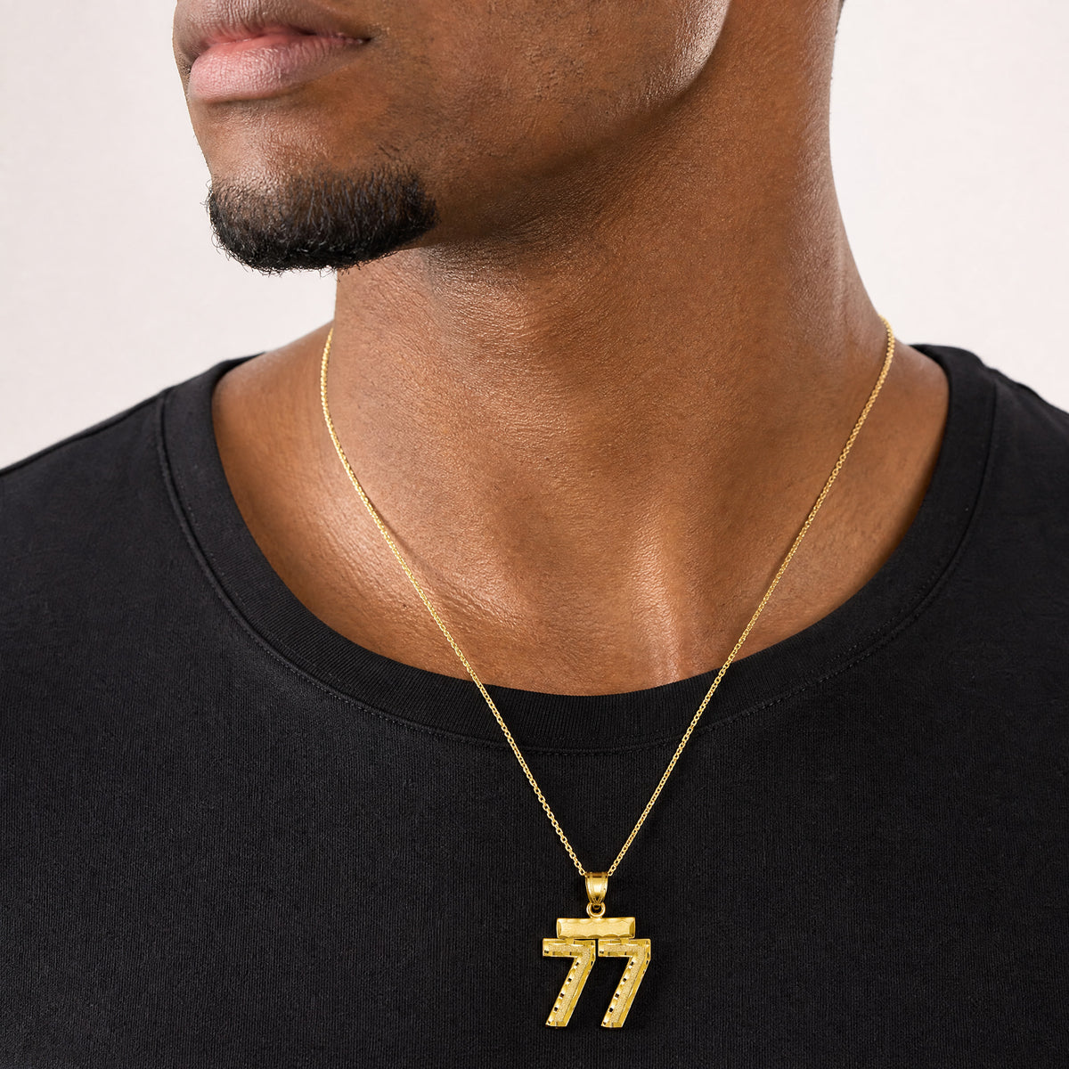 14k Small Brushed Diamond-cut Number 77 Charm - Model Shot
