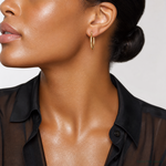 14k Polished 2x25mm Lightweight Tube Hoop Earrings - Model Shot