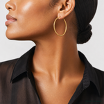 14k Diamond-cut 2mm Round Tube Hoop Earrings - Model Shot