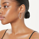 14K WG Knife Edge Diamond-cut Hollow Hoop Earrings - Model Shot