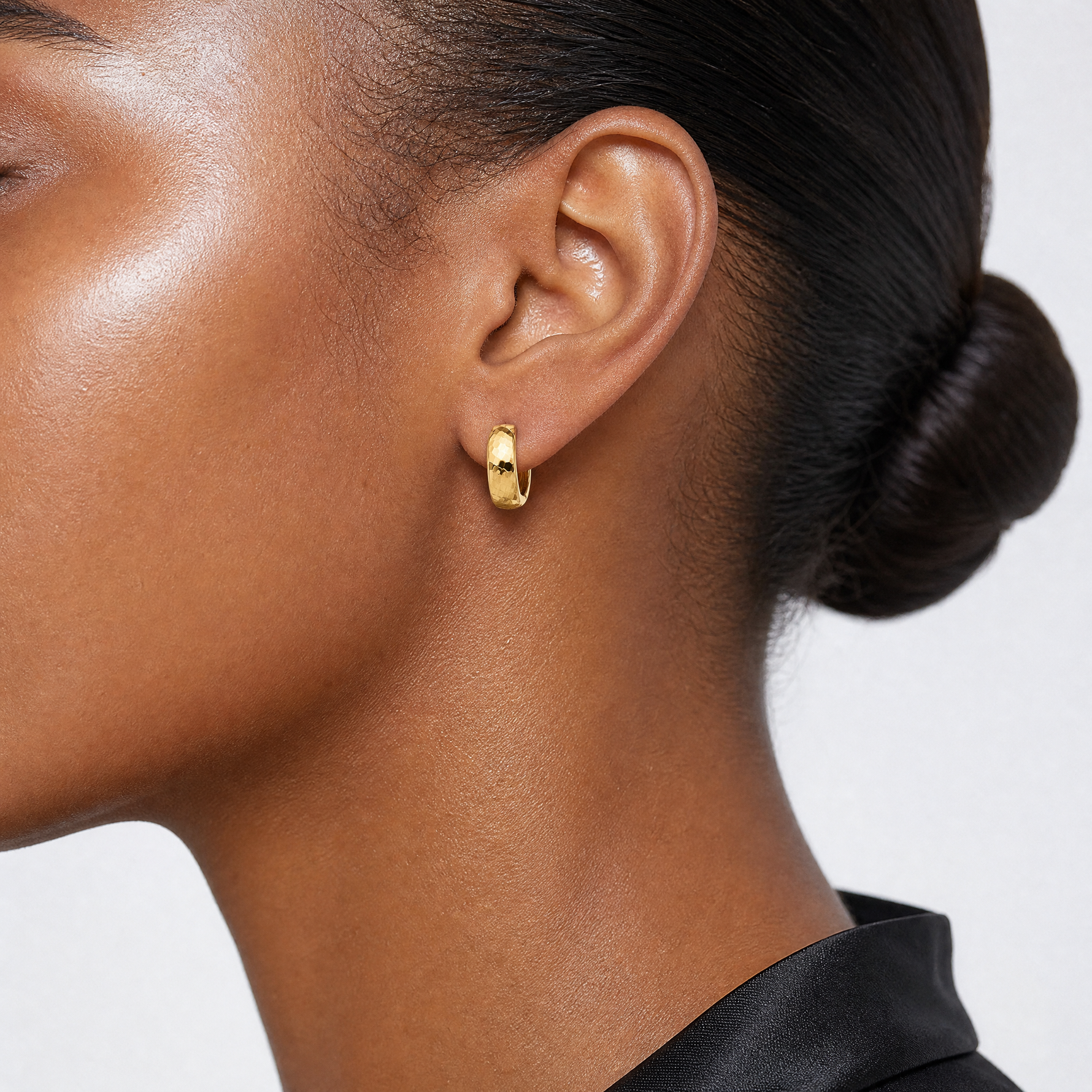 14K Polished and Diamond-cut Huggie Hoop Earrings - Model Shot