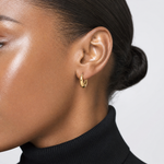 14K Polished Hinged Huggie Hoop Earrings - Model Shot