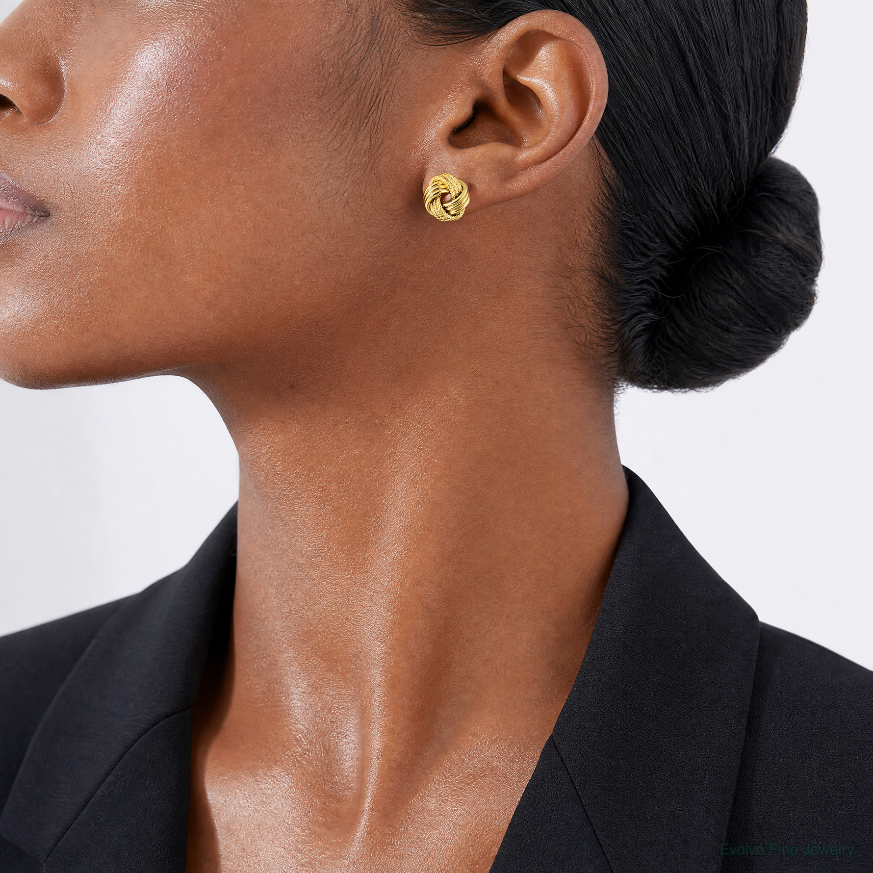 14k Polished Textured Love Knot Post Earrings - Model Shot