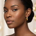 14k Polished Puffed Oval Hoop earrings - Model Shot