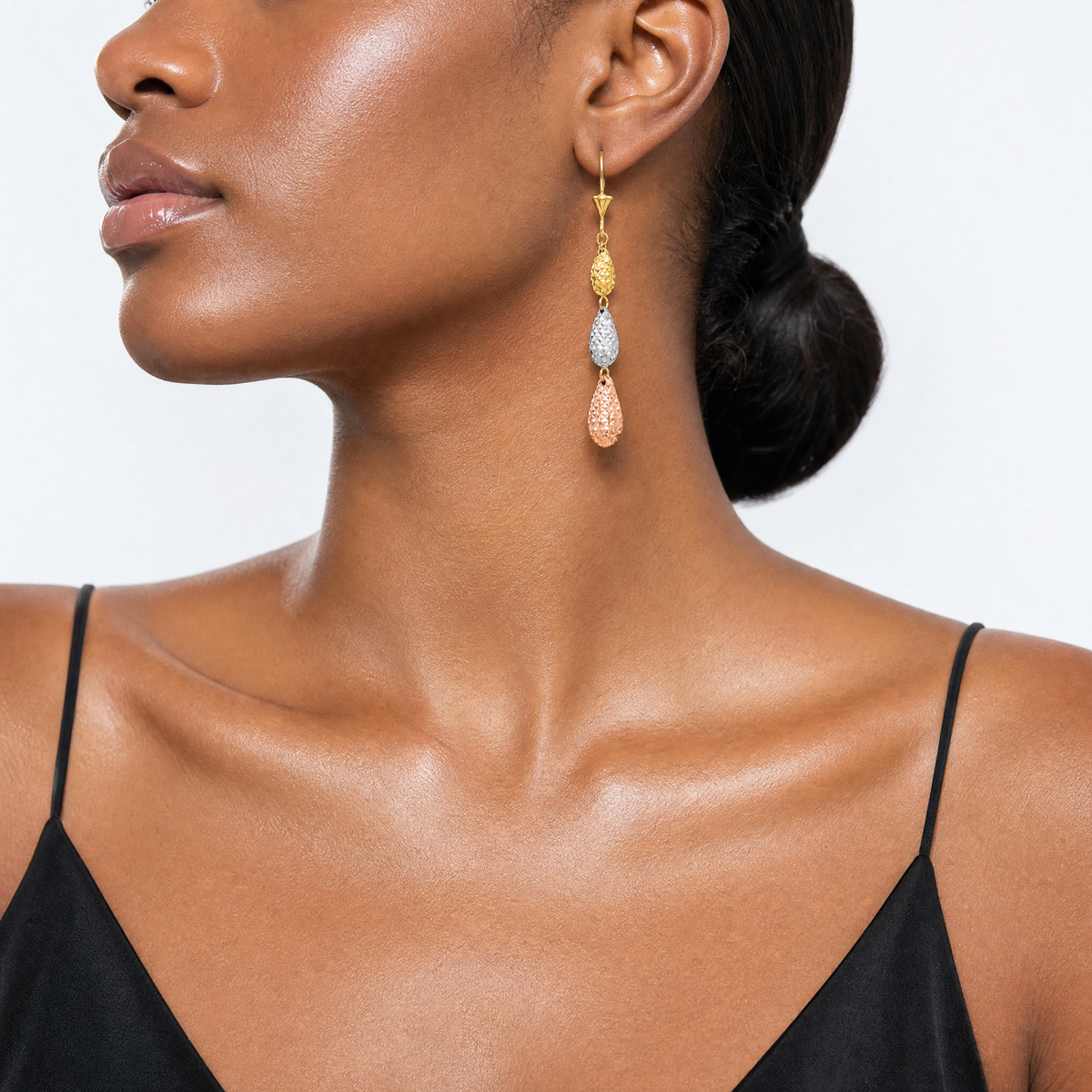 14k Tri-color Puff Diamond-cut Teardrop Dangle Earrings - Model Shot