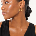 14K Satin Diamond Cut Hollow Twisted Hoop Earrings - Model Shot