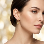 14K Rhodium Textured Hollow Oval w/ Hearts Hoop Earrings - Model Shot