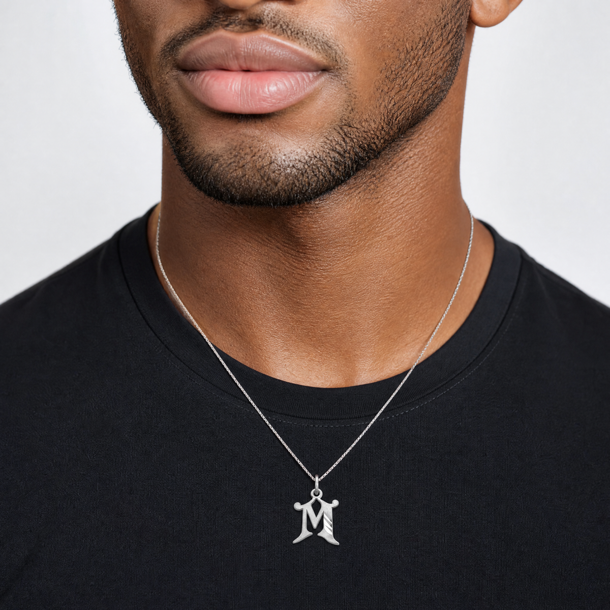 14KW Diamond-cut Letter M Initial Charm - Model Shot