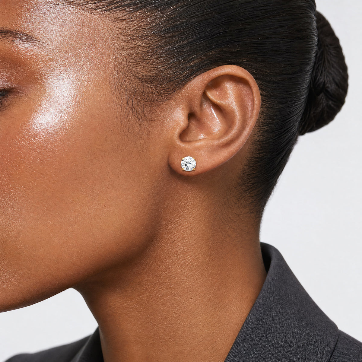 14k Polished 7mm CZ Stud Post Earrings - Model Shot
