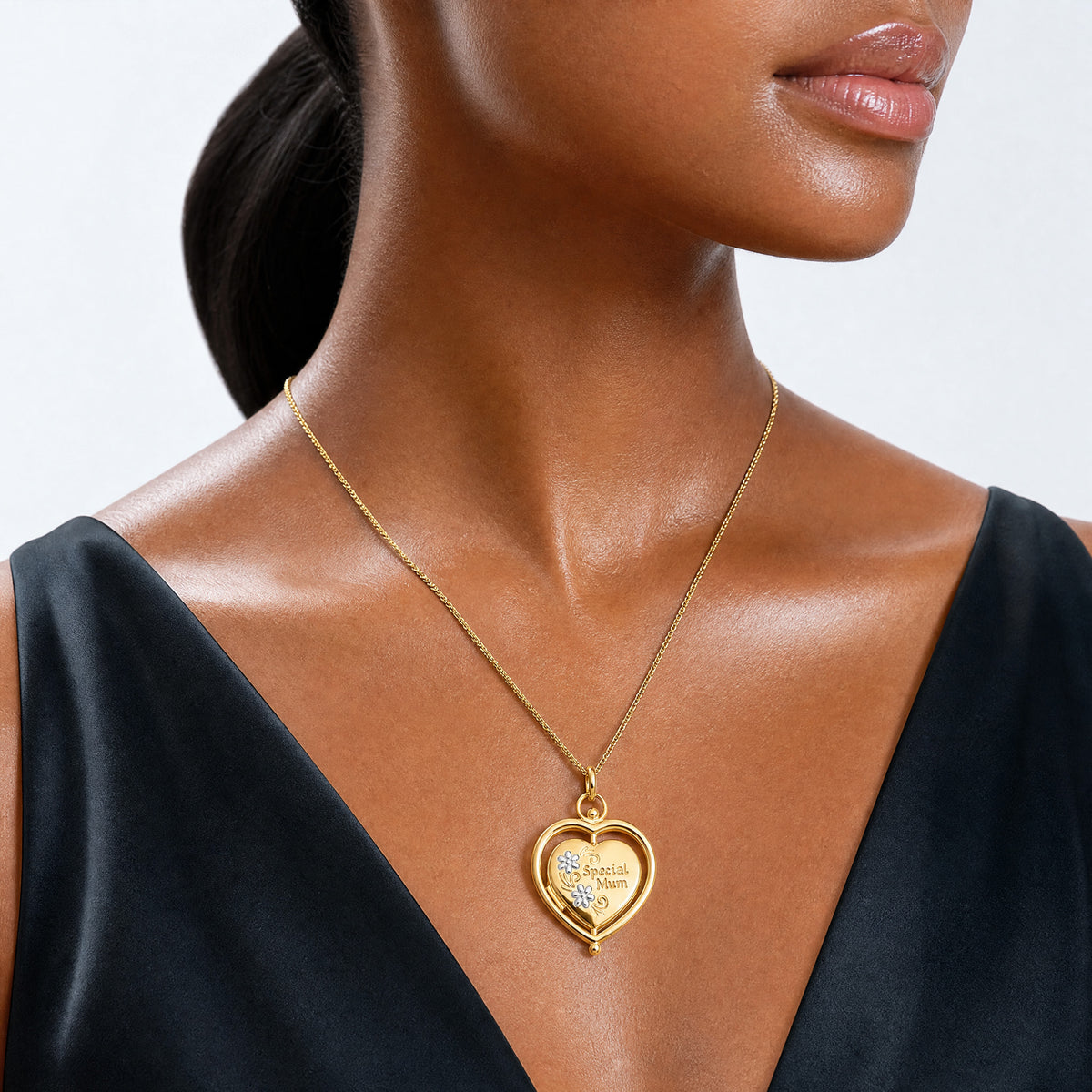 14K and White Rhodium Floral Special Mum Reversible Heart Locket - Model Shot