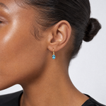 14k 6x4mm Oval Blue Topaz Leverback Earrings - Model Shot