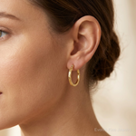 14k Polished and Satin Diamond-cut Hoop Earrings - Model Shot