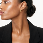 14K Polished Wavy Hinged Hoop Earrings - Model Shot