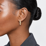 14k Polished CZ 4x20mm Huggie Hoop Earrings - Model Shot