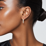 14k Polished CZ 4x18mm Huggie Hoop Earrings - Model Shot