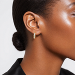 14k Polished CZ 4x14mm Huggie Hoop Earrings - Model Shot