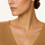 10K Polished CZ Infinity on Heart Charm - Model Shot