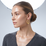 10k Satin and Polished Hollow Fancy Earrings - Model Shot