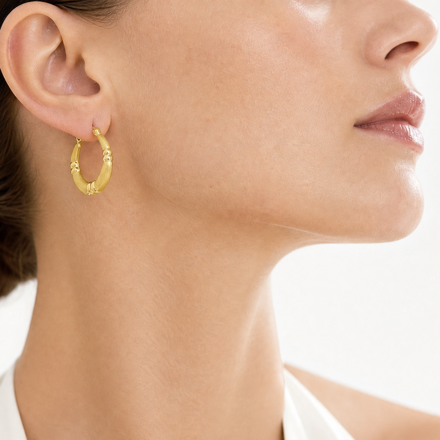 10k Polished and Satin Hoop Earrings - Model Shot