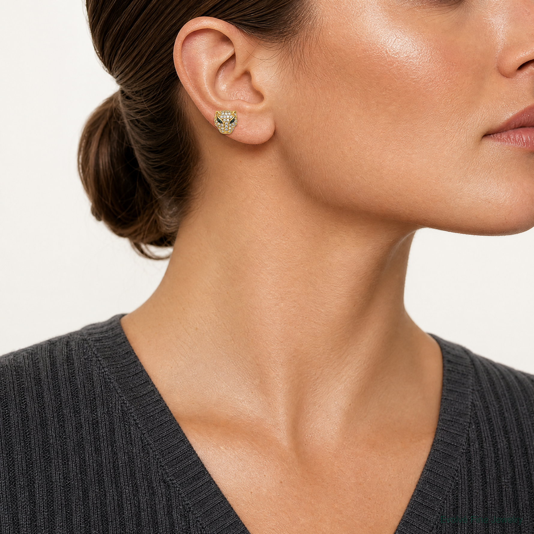 10K Polished Clear & Green CZ Lioness Head Post Earrings - Model Shot
