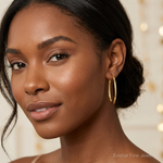 Leslie's 10K Polished Oval Hinged Hoop Earrings - Model Shot