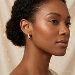 10K Brushed Diamond Cut Oval Hoop Earrings - Model Shot