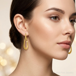 Leslie's 14K Polished Oval Hoop Earrings - Model Shot