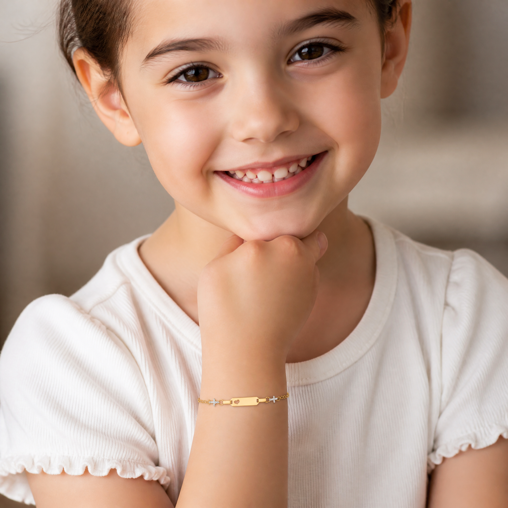 14K Two-tone Baby Polished and Textured Cross w/1in ext. ID Bracelet - Model Shot