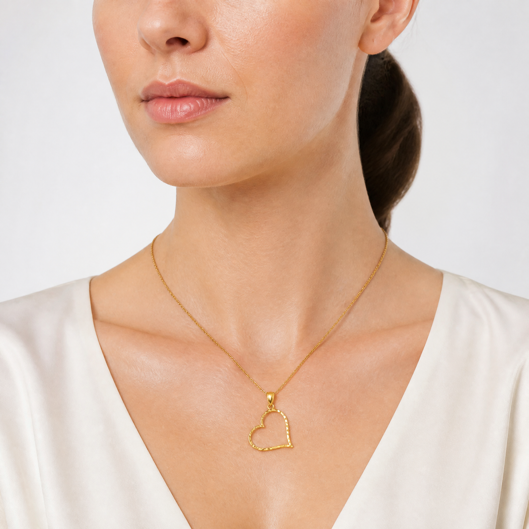 14K Satin Diamond-cut Crooked Heart Pendant - Model Shot
