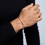 14K Rose Gold Polished Textured Slip-on Bangle Bracelet - Model Shot