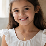 14k Two-tone Madi K CZ Moon with Heart Pendant - Model Shot