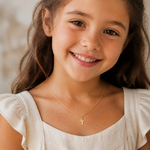 14k Madi K Children's Cross Pendant - Model Shot